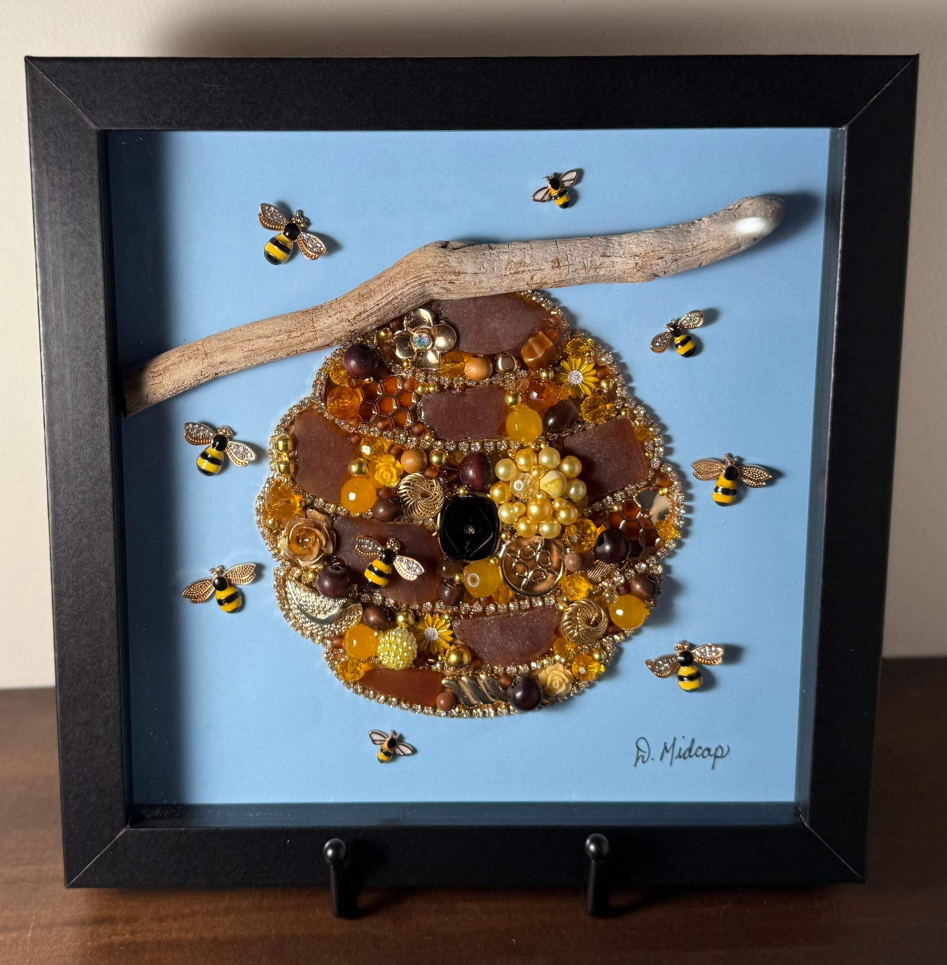 Brown sea glass buzzy beehive 
