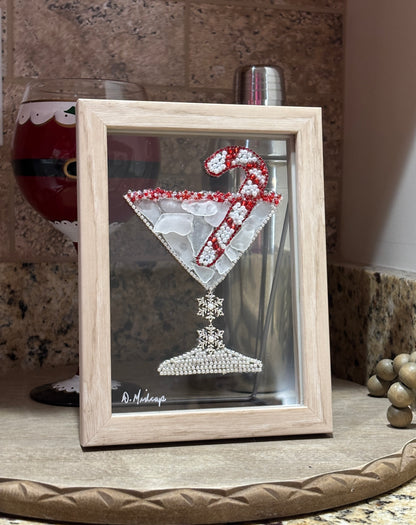 white sea glass filled candy cane martini